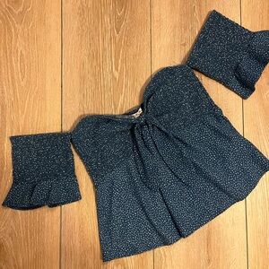 Blue off the shoulder express top with polka dot pattern in size M